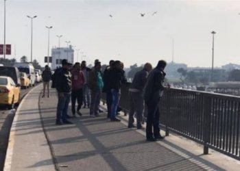 فتاة حاولت رمي نفسها  من اعلى جسر الجادرية, تم انقاذها
