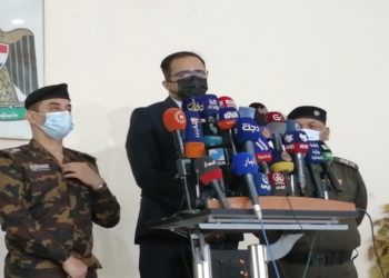 أول عملية تطعيم بلقاح كورونا في بغداد