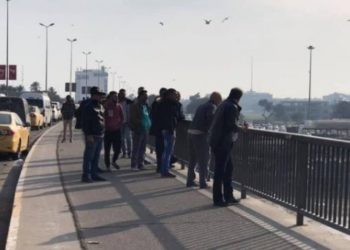 انقاذ امرأة رمت بنفسها من جسر الجادرية