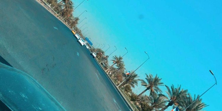 (صور+ فيديو)  تزيين شارع مطار بغداد بأعلام الدول المشاركة في “القمة”