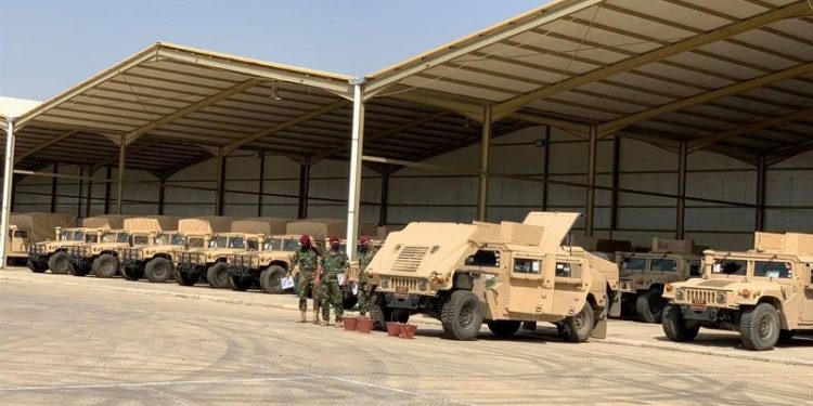 التحالف الدولي يسلم البيشمركة (149) عجلة وآلية عسكرية
