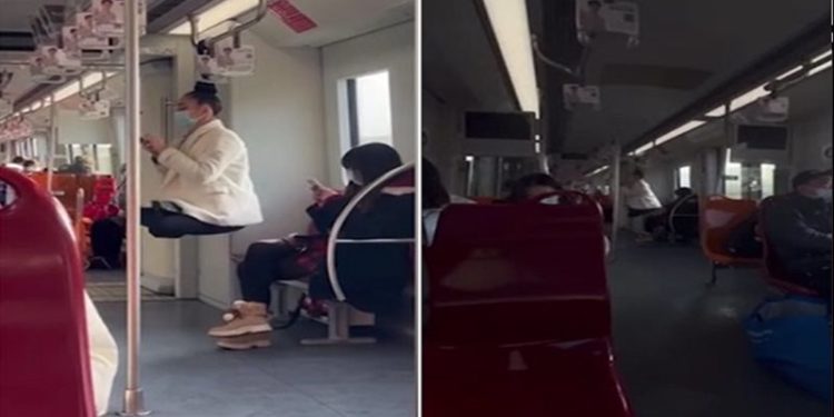 بالفيديو روسية تختار التعلق بواسطة شعرها في القطار