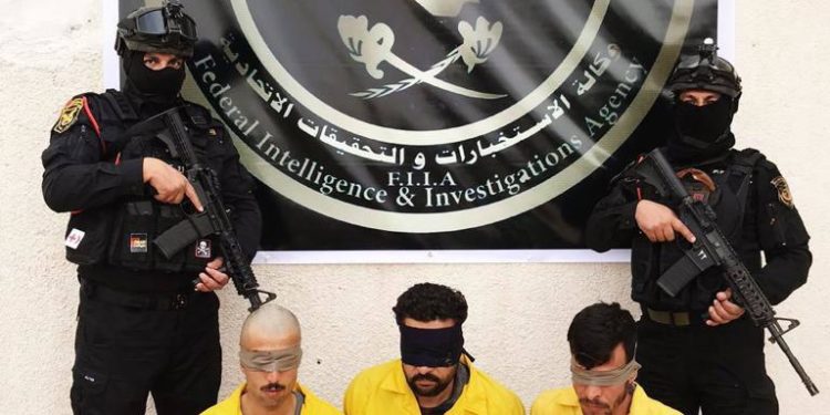 اعتقال 3 مطلوبين وضبط كدس عتاد بكركوك + صور