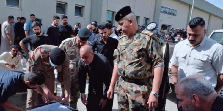 الدفاع تسلم رفات (26 شهيداً) من مجزرة سبايكر الى ذويهم