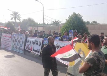 المفسوخة عقودهم يحاولون دخول مبنى هيئة الحشد الشعبي في بغداد