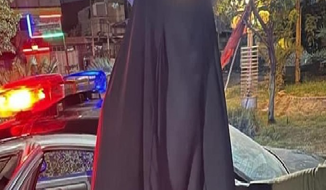 شرطة بغداد تقبض على متسول (بزي نسائي)