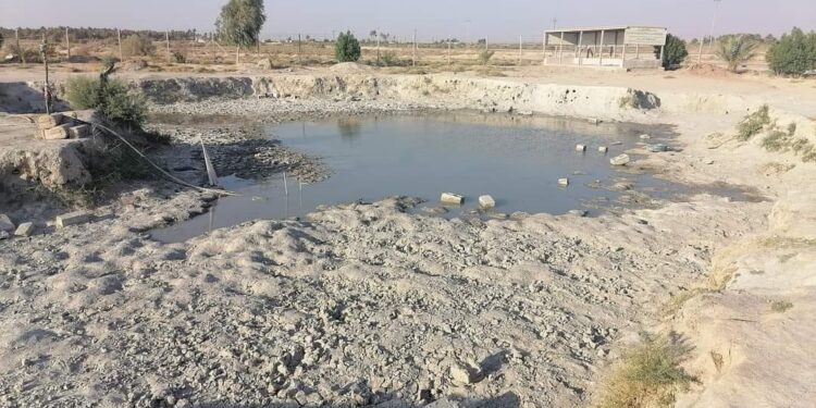 بالصور جفاف بركة العلاج “العجيبة” في ديالى