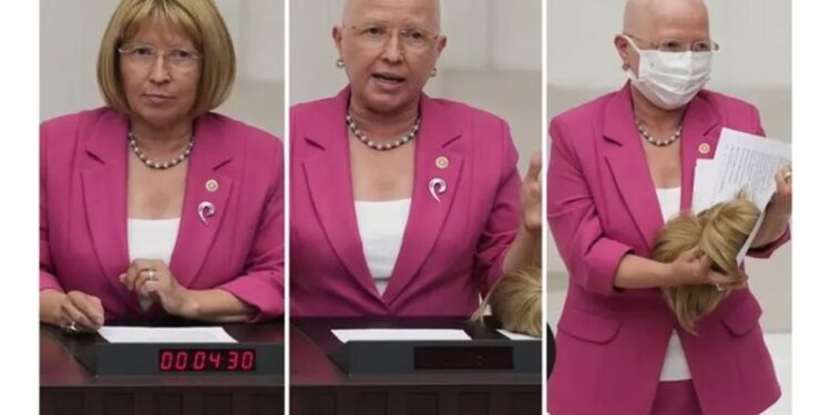 نائبة في البرلمان التركي تخلع شعرها المستعار,,, للتوعية بسرطان الثدي