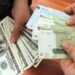 هبوط الريال الإيراني إلى أدنــــى مستوى على الإطلاق