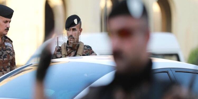 قوة أمنية تداهم مكتب فضائية في بغداد وتوقف بثها