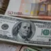 الدولار يتذبذب في آسيا.. اضطرابات فرنسا وإيطاليا تضغط على ثقة الأسواق